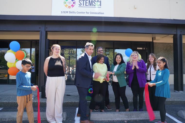 The ribbon is cut, officially opening the STEM Skills Center